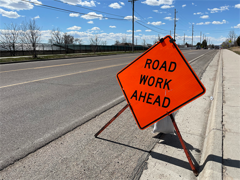An image of a road work sign on Dell Range Boulevard.