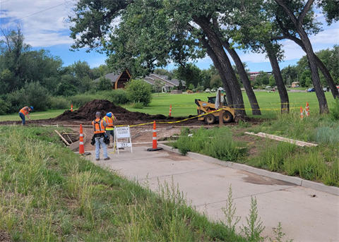 An image of crews performing maintenance on the Greater Cheyenne Greenway.